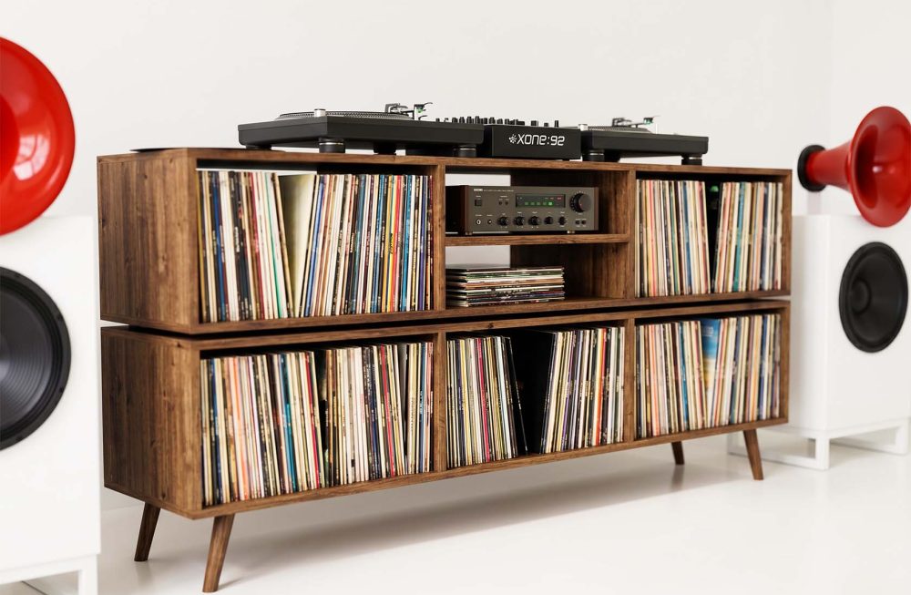 DJ mixing desk with vinyl record storage